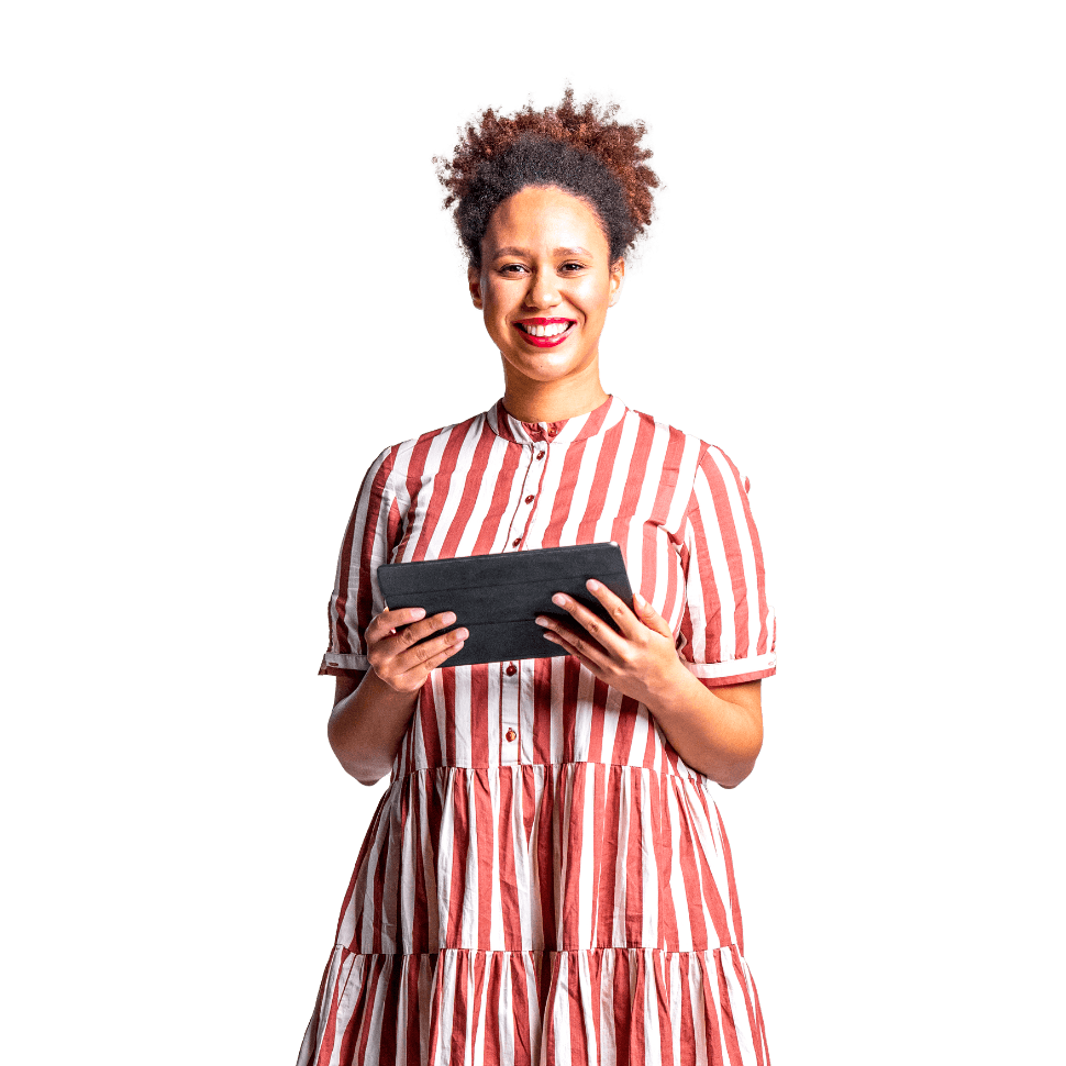 Smiling woman with curly hair wearing red and white striped dress holding black tablet against white background.