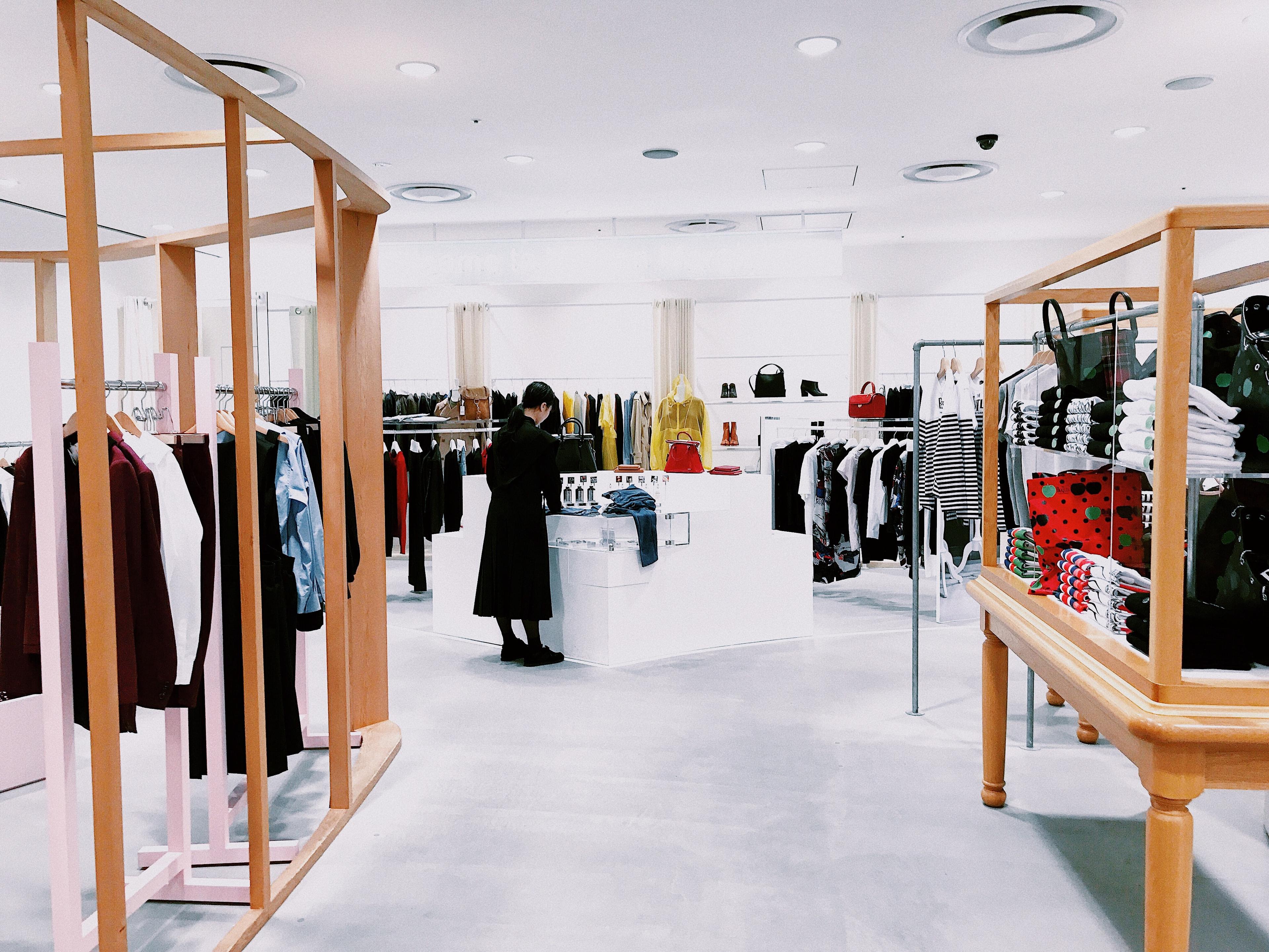A woman browsing a clean-looking store